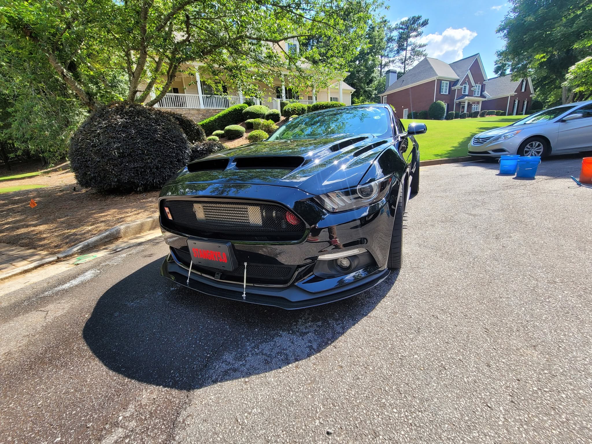 Mobile car detailing in a driveway in Cheshire, Connecticut