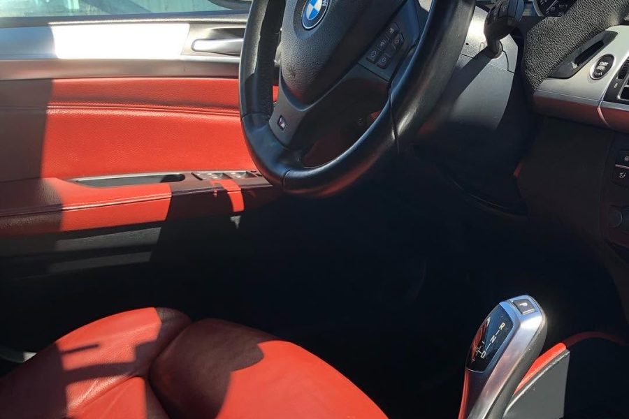 Vehicle cabin undergoing careful vacuuming with dashboard and upholstery cleaning in Altamonte Springs, Florida