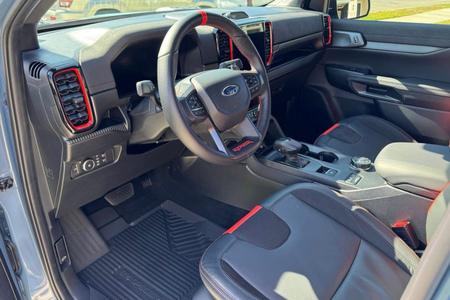 Car cabin receiving detailed vacuuming and dashboard care in Desser, Georgia
