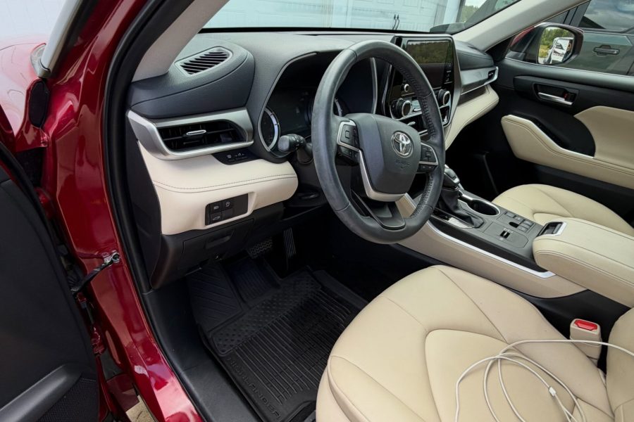 Car cabin undergoing careful vacuuming with dashboard and upholstery care in St. Petersburg, Florida