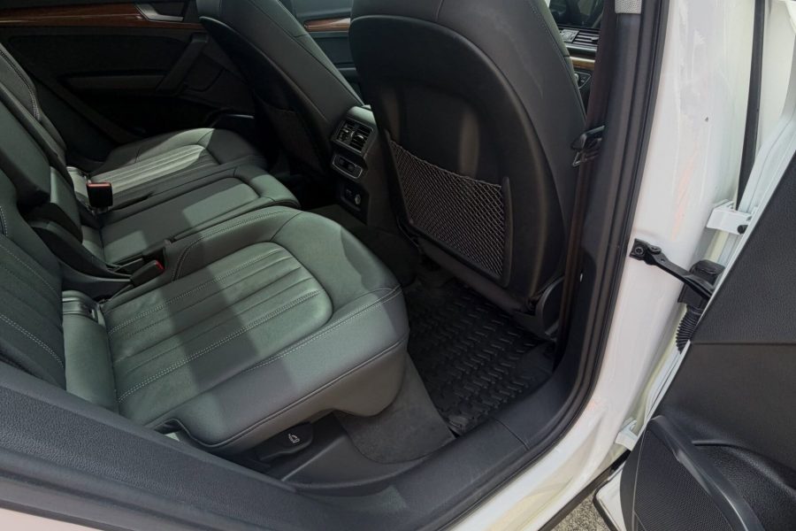 Car seats, dashboard, and center console receiving detailed cleaning in Tampa, Florida
