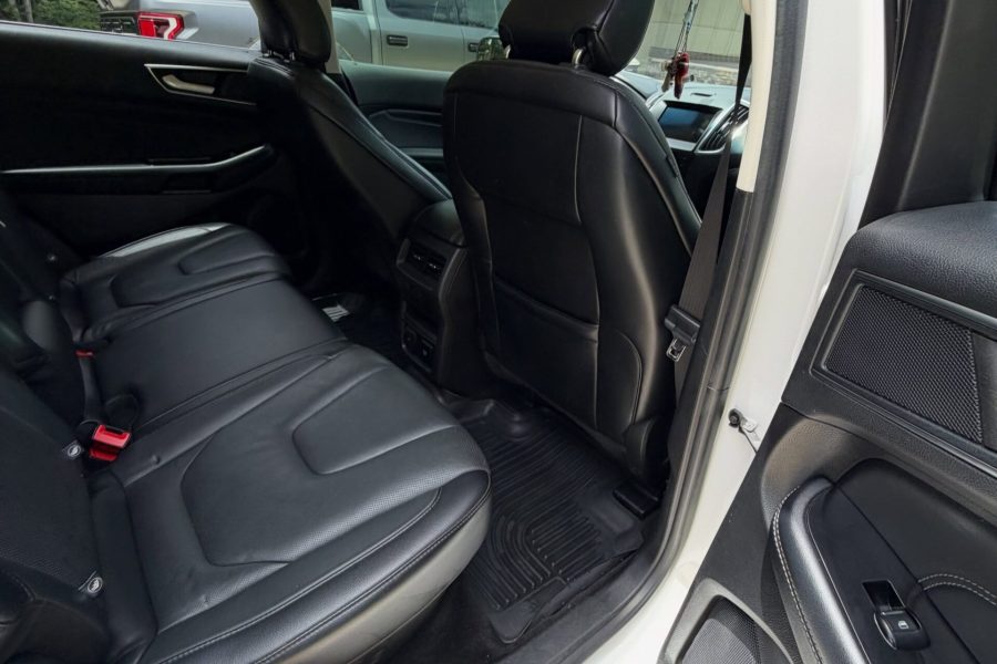 Car seats, dashboard, and center console receiving thorough cleaning in Vero Beach, Florida