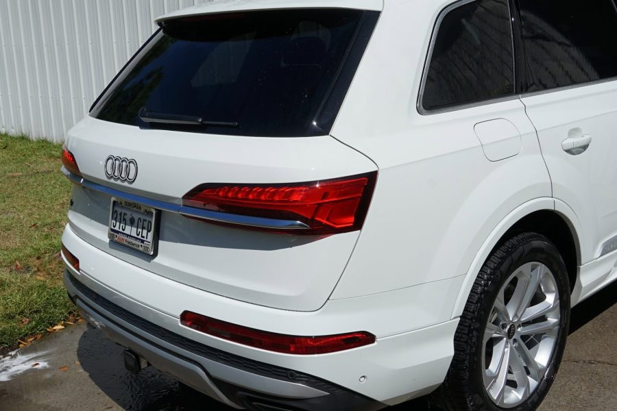 Soft brush cleaning around a vehicle’s exterior door handles in Yonkers, New York