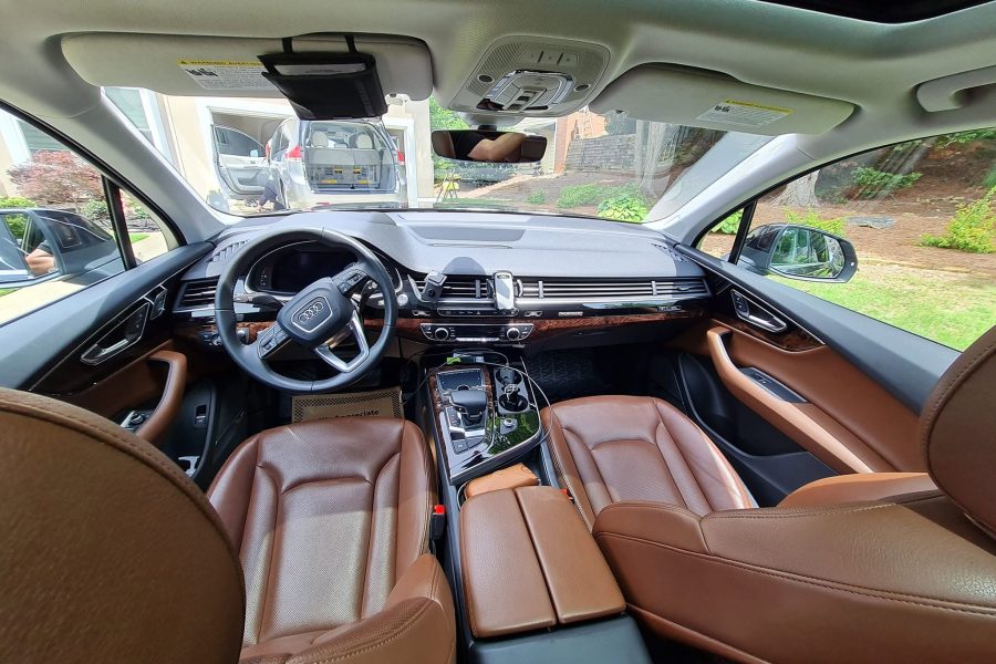 Vehicle seats, dashboard, and center console receiving thorough cleaning in Bay Shore, New York