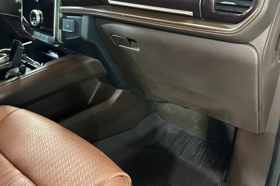 Upholstery extractor cleaning a fabric front seat in Redondo Beach, California