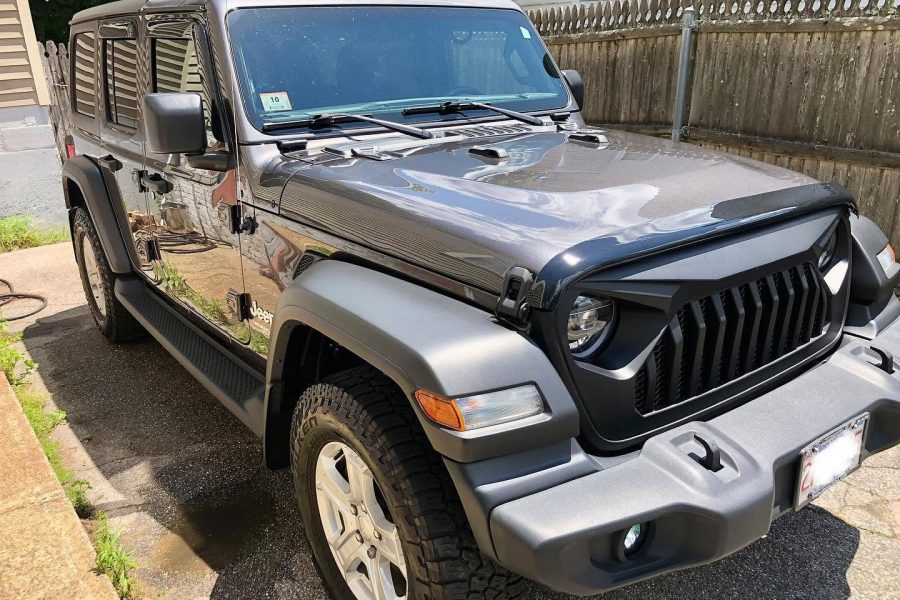 Hand drying a car after exterior detailing in Smyrna, Georgia