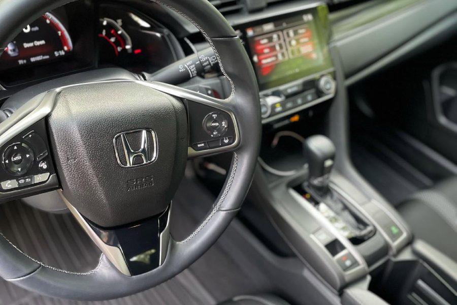Detailed car interior vacuuming and dashboard cleaning in Fairfield, Alabama