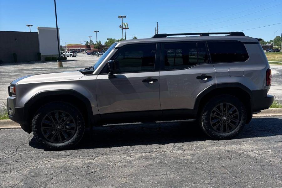 Mobile detailing professional servicing a vehicle at a customer’s location in Lindsey, Alabama